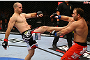 TORONTO, CANADA - SEPTEMBER 22: (L-R) Matt Hamill kicks Roger Hollett during their light heavyweight bout at UFC 152 inside Air Canada Centre on September 22, 2012 in Toronto, Ontario, Canada. (Photo by Al Bello/Zuffa LLC/Zuffa LLC via Getty Images)