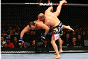 TORONTO, CANADA - SEPTEMBER 22: (R-L) Matt Hamill takes down Roger Hollett during their light heavyweight bout at UFC 152 inside Air Canada Centre on September 22, 2012 in Toronto, Ontario, Canada. (Photo by Al Bello/Zuffa LLC/Zuffa LLC via Getty Images)