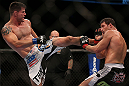 TORONTO, CANADA - SEPTEMBER 22: (L-R) Brian Stann kicks Michael Bisping during their middleweight bout at UFC 152 inside Air Canada Centre on September 22, 2012 in Toronto, Ontario, Canada. (Photo by Josh Hedges/Zuffa LLC/Zuffa LLC via Getty Images)