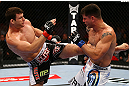 TORONTO, CANADA - SEPTEMBER 22: (L-R) Michael Bisping kicks Brian Stann during their middleweight bout at UFC 152 inside Air Canada Centre on September 22, 2012 in Toronto, Ontario, Canada. (Photo by Al Bello/Zuffa LLC/Zuffa LLC via Getty Images)