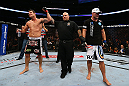 TORONTO, CANADA - SEPTEMBER 22: Michael Bisping (L) reacts after defeating Brian Stann (R) during their middleweight bout at UFC 152 inside Air Canada Centre on September 22, 2012 in Toronto, Ontario, Canada. (Photo by Al Bello/Zuffa LLC/Zuffa LLC via Getty Images)