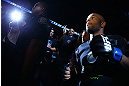 TORONTO, CANADA - SEPTEMBER 22: Demetrious Johnson enters the arena before his flyweight championship bout against Joseph Benavidez at UFC 152 inside Air Canada Centre on September 22, 2012 in Toronto, Ontario, Canada. (Photo by Al Bello/Zuffa LLC/Zuffa LLC via Getty Images)