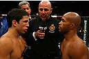 TORONTO, CANADA - SEPTEMBER 22: Opponents Joseph Benavidez (L) and Demetrious Johnson (R) receive final instructions from referee Yves Lavigne before their flyweight championship bout at UFC 152 inside Air Canada Centre on September 22, 2012 in Toronto, Ontario, Canada. (Photo by Al Bello/Zuffa LLC/Zuffa LLC via Getty Images)