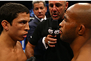 TORONTO, CANADA - SEPTEMBER 22: Opponents Joseph Benavidez (L) and Demetrious Johnson (R) receive final instructions from referee Yves Lavigne before their flyweight championship bout at UFC 152 inside Air Canada Centre on September 22, 2012 in Toronto, Ontario, Canada. (Photo by Al Bello/Zuffa LLC/Zuffa LLC via Getty Images)