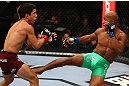 TORONTO, CANADA - SEPTEMBER 22: (R-L) Demetrious Johnson kicks Joseph Benavidez during their flyweight championship bout at UFC 152 inside Air Canada Centre on September 22, 2012 in Toronto, Ontario, Canada. (Photo by Al Bello/Zuffa LLC/Zuffa LLC via Getty Images)