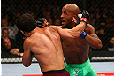 TORONTO, CANADA - SEPTEMBER 22: (R-L) Demetrious Johnson and Joseph Benavidez trade punches during their flyweight championship bout at UFC 152 inside Air Canada Centre on September 22, 2012 in Toronto, Ontario, Canada. (Photo by Al Bello/Zuffa LLC/Zuffa LLC via Getty Images)