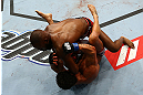 Jon Jones (top) delivers an elbow against Vitor Belfort during their light heavyweight championship bout at UFC 152 inside Air Canada Centre on September 22, 2012 in Toronto, Ontario, Canada. (Photo by Al Bello/Zuffa LLC/Zuffa LLC via Getty Images)