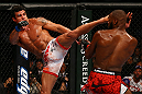 TORONTO, CANADA - SEPTEMBER 22: (L-R) Vitor Belfort kicks Jon Jones during their light heavyweight championship bout at UFC 152 inside Air Canada Centre on September 22, 2012 in Toronto, Ontario, Canada. (Photo by Al Bello/Zuffa LLC/Zuffa LLC via Getty Images)