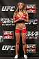 NOTTINGHAM, ENGLAND - SEPTEMBER 28:  UFC Octagon Girl Brittney Palmer stands on stage during the UFC on Fuel TV weigh in at Capital FM Arena on September 28, 2012 in Nottingham, England.  (Photo by Josh Hedges/Zuffa LLC/Zuffa LLC via Getty Images)