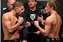 NOTTINGHAM, ENGLAND - SEPTEMBER 28:  (L-R) Opponents DaMarques Johnson and Gunnar Nelson face off during the UFC on Fuel TV weigh in at Capital FM Arena on September 28, 2012 in Nottingham, England.  (Photo by Josh Hedges/Zuffa LLC/Zuffa LLC via Getty Images)