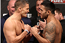 NOTTINGHAM, ENGLAND - SEPTEMBER 28:  (L-R) Opponents Tom Watson and Brad Tavares face off during the UFC on Fuel TV weigh in at Capital FM Arena on September 28, 2012 in Nottingham, England.  (Photo by Josh Hedges/Zuffa LLC/Zuffa LLC via Getty Images)