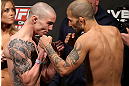 NOTTINGHAM, ENGLAND - SEPTEMBER 28:  (L-R) Opponents Andy Ogle and Akira Corassani face off during the UFC on Fuel TV weigh in at Capital FM Arena on September 28, 2012 in Nottingham, England.  (Photo by Josh Hedges/Zuffa LLC/Zuffa LLC via Getty Images)