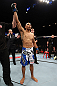 NOTTINGHAM, ENGLAND - SEPTEMBER 29:  Robbie Peralta reacts after knocking out Jason Young during their featherweight fight at the UFC on Fuel TV event at Capital FM Arena on September 29, 2012 in Nottingham, England.  (Photo by Josh Hedges/Zuffa LLC/Zuffa LLC via Getty Images)