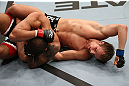NOTTINGHAM, ENGLAND - SEPTEMBER 29:  (R-L) Gunnar Nelson punches DaMarques Johnson during their catchweight fight at the UFC on Fuel TV event at Capital FM Arena on September 29, 2012 in Nottingham, England.  (Photo by Josh Hedges/Zuffa LLC/Zuffa LLC via Getty Images)