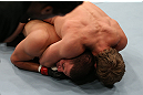 NOTTINGHAM, ENGLAND - SEPTEMBER 29:  (R-L) Gunnar Nelson secures a rear choke submission against DaMarques Johnson during their catchweight fight at the UFC on Fuel TV event at Capital FM Arena on September 29, 2012 in Nottingham, England.  (Photo by Josh Hedges/Zuffa LLC/Zuffa LLC via Getty Images)