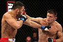 NOTTINGHAM, ENGLAND - SEPTEMBER 29:  (R-L) Tom Watson punches Brad Tavares during their middleweight fight at the UFC on Fuel TV event at Capital FM Arena on September 29, 2012 in Nottingham, England.  (Photo by Josh Hedges/Zuffa LLC/Zuffa LLC via Getty Images)