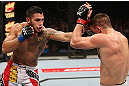 NOTTINGHAM, ENGLAND - SEPTEMBER 29:  (L-R) Brad Tavares punches Tom Watson during their middleweight fight at the UFC on Fuel TV event at Capital FM Arena on September 29, 2012 in Nottingham, England.  (Photo by Josh Hedges/Zuffa LLC/Zuffa LLC via Getty Images)