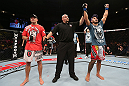 NOTTINGHAM, ENGLAND - SEPTEMBER 29:  Brad Tavares (R) reacts after defeating Tom Watson (L) during their middleweight fight at the UFC on Fuel TV event at Capital FM Arena on September 29, 2012 in Nottingham, England.  (Photo by Josh Hedges/Zuffa LLC/Zuffa LLC via Getty Images)