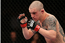 NOTTINGHAM, ENGLAND - SEPTEMBER 29:  Andy Ogle stands in the Octagon during his featherweight fight against Akira Corassani at the UFC on Fuel TV event at Capital FM Arena on September 29, 2012 in Nottingham, England.  (Photo by Josh Hedges/Zuffa LLC/Zuffa LLC via Getty Images)