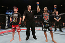 NOTTINGHAM, ENGLAND - SEPTEMBER 29:  Akira Corassani (R) reacts after defeating Andy Ogle (L) during their featherweight fight at the UFC on Fuel TV event at Capital FM Arena on September 29, 2012 in Nottingham, England.  (Photo by Josh Hedges/Zuffa LLC/Zuffa LLC via Getty Images)