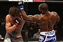 NOTTINGHAM, ENGLAND - SEPTEMBER 29:  (R-L) Jimi Manuwa punches Kyle Kingsbury during their light heavyweight fight at the UFC on Fuel TV event at Capital FM Arena on September 29, 2012 in Nottingham, England.  (Photo by Josh Hedges/Zuffa LLC/Zuffa LLC via Getty Images)