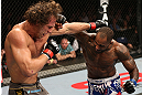 NOTTINGHAM, ENGLAND - SEPTEMBER 29:  (R-L) Jimi Manuwa punches Kyle Kingsbury during their light heavyweight fight at the UFC on Fuel TV event at Capital FM Arena on September 29, 2012 in Nottingham, England.  (Photo by Josh Hedges/Zuffa LLC/Zuffa LLC via Getty Images)