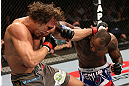 NOTTINGHAM, ENGLAND - SEPTEMBER 29:  (R-L) Jimi Manuwa punches Kyle Kingsbury during their light heavyweight fight at the UFC on Fuel TV event at Capital FM Arena on September 29, 2012 in Nottingham, England.  (Photo by Josh Hedges/Zuffa LLC/Zuffa LLC via Getty Images)
