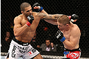 NOTTINGHAM, ENGLAND - SEPTEMBER 29:  (L-R) Che Mills and Duane Ludwig trade punches during their welterweight fight at the UFC on Fuel TV event at Capital FM Arena on September 29, 2012 in Nottingham, England.  (Photo by Josh Hedges/Zuffa LLC/Zuffa LLC via Getty Images)