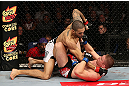 NOTTINGHAM, ENGLAND - SEPTEMBER 29:  (L-R) Che Mills punches Duane Ludwig during their welterweight fight at the UFC on Fuel TV event at Capital FM Arena on September 29, 2012 in Nottingham, England.  (Photo by Josh Hedges/Zuffa LLC/Zuffa LLC via Getty Images)