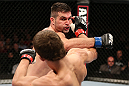 NOTTINGHAM, ENGLAND - SEPTEMBER 29:  (R-L) John Maguire punches John Hathaway during their welterweight fight at the UFC on Fuel TV event at Capital FM Arena on September 29, 2012 in Nottingham, England.  (Photo by Josh Hedges/Zuffa LLC/Zuffa LLC via Getty Images)