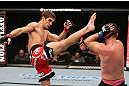 NOTTINGHAM, ENGLAND - SEPTEMBER 29:  (L-R) John Hathaway kicks John Maguire during their welterweight fight at the UFC on Fuel TV event at Capital FM Arena on September 29, 2012 in Nottingham, England.  (Photo by Josh Hedges/Zuffa LLC/Zuffa LLC via Getty Images)