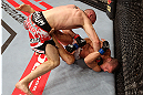 NOTTINGHAM, ENGLAND - SEPTEMBER 29:  (L-R) Paul Sass punches Matt Wiman during their lightweight fight at the UFC on Fuel TV event at Capital FM Arena on September 29, 2012 in Nottingham, England.  (Photo by Josh Hedges/Zuffa LLC/Zuffa LLC via Getty Images)