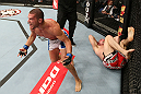 NOTTINGHAM, ENGLAND - SEPTEMBER 29:  Matt Wiman (L) reacts after defeating Paul Sass during their lightweight fight at the UFC on Fuel TV event at Capital FM Arena on September 29, 2012 in Nottingham, England.  (Photo by Josh Hedges/Zuffa LLC/Zuffa LLC via Getty Images)