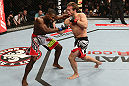 NOTTINGHAM, ENGLAND - SEPTEMBER 29:  (R-L) Brad Pickett knocks out Yves Jabouin with an uppercut during their bantamweight fight at the UFC on Fuel TV event at Capital FM Arena on September 29, 2012 in Nottingham, England.  (Photo by Josh Hedges/Zuffa LLC/Zuffa LLC via Getty Images)