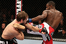 NOTTINGHAM, ENGLAND - SEPTEMBER 29:  (R-L) Yves Jabouin kicks Brad Pickett during their bantamweight fight at the UFC on Fuel TV event at Capital FM Arena on September 29, 2012 in Nottingham, England.  (Photo by Josh Hedges/Zuffa LLC/Zuffa LLC via Getty Images)
