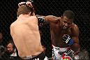 NOTTINGHAM, ENGLAND - SEPTEMBER 29:  (R-L) Yves Jabouin punches Brad Pickett during their bantamweight fight at the UFC on Fuel TV event at Capital FM Arena on September 29, 2012 in Nottingham, England.  (Photo by Josh Hedges/Zuffa LLC/Zuffa LLC via Getty Images)