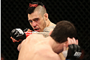 NOTTINGHAM, ENGLAND - SEPTEMBER 29:  (L-R) Dan Hardy punches Amir Sadollah during their welterweight fight at the UFC on Fuel TV event at Capital FM Arena on September 29, 2012 in Nottingham, England.  (Photo by Josh Hedges/Zuffa LLC/Zuffa LLC via Getty Images)