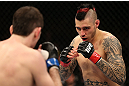 NOTTINGHAM, ENGLAND - SEPTEMBER 29:  (R-L) Dan Hardy squares off with Amir Sadollah during their welterweight fight at the UFC on Fuel TV event at Capital FM Arena on September 29, 2012 in Nottingham, England.  (Photo by Josh Hedges/Zuffa LLC/Zuffa LLC via Getty Images)