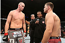 NOTTINGHAM, ENGLAND - SEPTEMBER 29:  Opponents Strefan Struve (L) and Stipe Miocic (R) receive final instructions from referee Herb Dean before their heavyweight fight at the UFC on Fuel TV event at Capital FM Arena on September 29, 2012 in Nottingham, England.  (Photo by Josh Hedges/Zuffa LLC/Zuffa LLC via Getty Images)