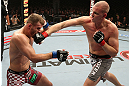 NOTTINGHAM, ENGLAND - SEPTEMBER 29:  (R-L) Strefan Struve punches Stipe Miocic during their heavyweight fight at the UFC on Fuel TV event at Capital FM Arena on September 29, 2012 in Nottingham, England.  (Photo by Josh Hedges/Zuffa LLC/Zuffa LLC via Getty Images)