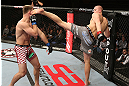 NOTTINGHAM, ENGLAND - SEPTEMBER 29:  (R-L) Strefan Struve kicks Stipe Miocic during their heavyweight fight at the UFC on Fuel TV event at Capital FM Arena on September 29, 2012 in Nottingham, England.  (Photo by Josh Hedges/Zuffa LLC/Zuffa LLC via Getty Images)