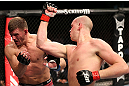 NOTTINGHAM, ENGLAND - SEPTEMBER 29:  (R-L) Strefan Struve punches Stipe Miocic during their heavyweight fight at the UFC on Fuel TV event at Capital FM Arena on September 29, 2012 in Nottingham, England.  (Photo by Josh Hedges/Zuffa LLC/Zuffa LLC via Getty Images)
