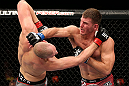 NOTTINGHAM, ENGLAND - SEPTEMBER 29:  (R-L) Stipe Miocic punches Strefan Struve during their heavyweight fight at the UFC on Fuel TV event at Capital FM Arena on September 29, 2012 in Nottingham, England.  (Photo by Josh Hedges/Zuffa LLC/Zuffa LLC via Getty Images)