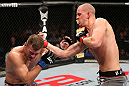 NOTTINGHAM, ENGLAND - SEPTEMBER 29:  (R-L) Strefan Struve punches Stipe Miocic during their heavyweight fight at the UFC on Fuel TV event at Capital FM Arena on September 29, 2012 in Nottingham, England.  (Photo by Josh Hedges/Zuffa LLC/Zuffa LLC via Getty Images)