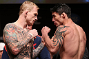 MINNEAPOLIS, MN - OCTOBER 04:  (L-R) Opponents Bart Palaszewski and Diego Nunes face off during the UFC on FX weigh in at Pantages Theater on October 4, 2012 in Minneapolis, Minnesota.  (Photo by Josh Hedges/Zuffa LLC/Zuffa LLC via Getty Images)