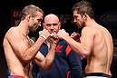 MINNEAPOLIS, MN - OCTOBER 04:  (L-R) Opponents Jacob Volkmann and Shane Roller face off during the UFC on FX weigh in at Pantages Theater on October 4, 2012 in Minneapolis, Minnesota.  (Photo by Josh Hedges/Zuffa LLC/Zuffa LLC via Getty Images)