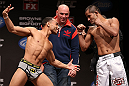MINNEAPOLIS, MN - OCTOBER 04:  (L-R) Opponents John Dodson and Jussier Formiga face off during the UFC on FX weigh in at Pantages Theater on October 4, 2012 in Minneapolis, Minnesota.  (Photo by Josh Hedges/Zuffa LLC/Zuffa LLC via Getty Images)