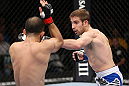 MINNEAPOLIS, MN - OCTOBER 05:  (R-L) Phil Harris punches Darren Uyenoyama during their flyweight fight at the UFC on FX event at Target Center on October 5, 2012 in Minneapolis, Minnesota.  (Photo by Josh Hedges/Zuffa LLC/Zuffa LLC via Getty Images)