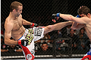 MINNEAPOLIS, MN - OCTOBER 05:  (L-R) Jacob Volkmann kicks Shane Roller during their lightweight fight at the UFC on FX event at Target Center on October 5, 2012 in Minneapolis, Minnesota.  (Photo by Josh Hedges/Zuffa LLC/Zuffa LLC via Getty Images)