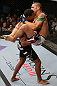 MINNEAPOLIS, MN - OCTOBER 05:  (R-L) Carlo Prater attempts a flying triangle choke against Marcus LeVesseur at the UFC on FX event at Target Center on October 5, 2012 in Minneapolis, Minnesota.  (Photo by Josh Hedges/Zuffa LLC/Zuffa LLC via Getty Images)